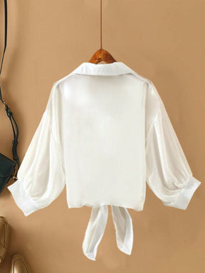 Blusa feminina de praia com amarre frontal Lilian. Plus Size